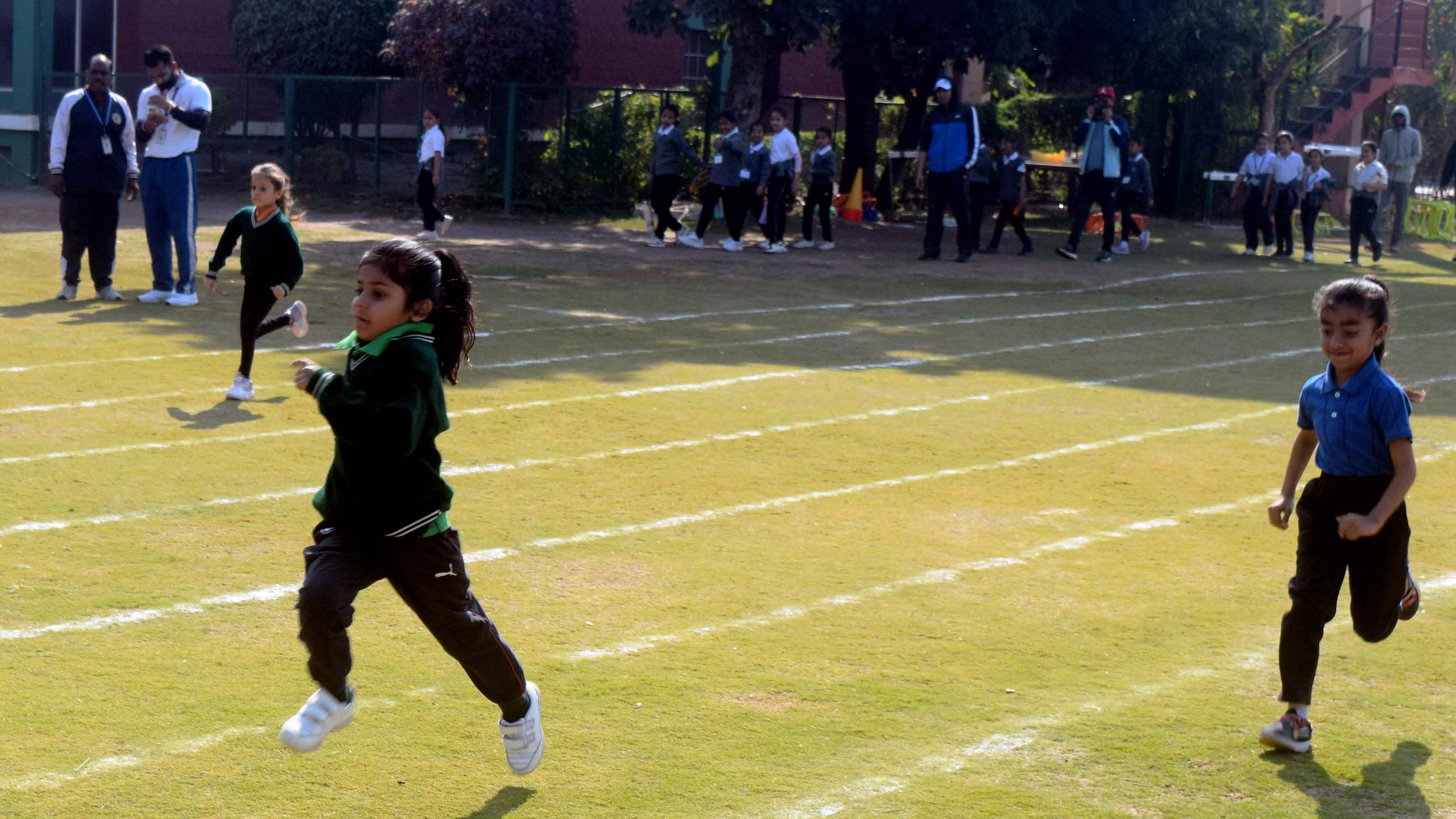 Students showcasing sportsmanship at Athletic Meet